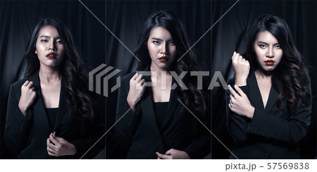 Asian Business Woman in black Formal Suit Asian Business Woman in black Formal Suit 57569838