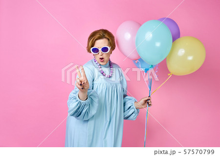lovely funky old woman blows a kiss. Elderly people. an outpost for dating sites, a wedding agency. lovely funky old woman blows a kiss. Elderly people. an outpost for dating sites, a wedding agency. 57570799