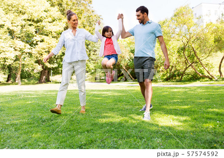 happy family walking in summer park 57574592