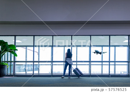 Traveler woman plan and backpack see 57576525