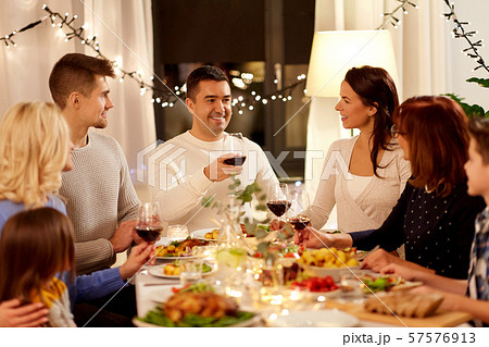 happy family having dinner party at home happy family having dinner party at home 57576913
