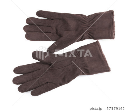 Knitted woolen brown gloves on a white background Knitted woolen brown gloves on a white background 57579162