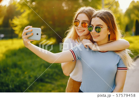 two sister in a park two sister in a park 57579458