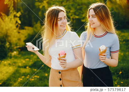 two sister in a park two sister in a park 57579617