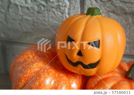 The pumpkin jack on wood table for halloween concept. 57580011