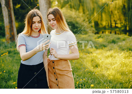 two sister in a park 57580313