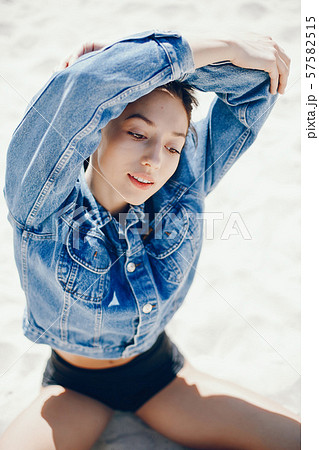 Sunny girl on a beach 57582515