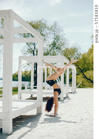 Sport girl on a beach 57583810