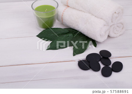 Spa still life with aromatic candles, orchid flower and stones 57588691
