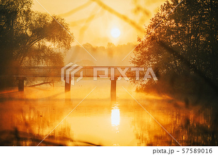 Photo of river, bridge at sunrise 57589016