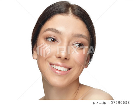 Portrait of beautiful young woman isolated on white studio background Portrait of beautiful young woman isolated on white studio background 57596638
