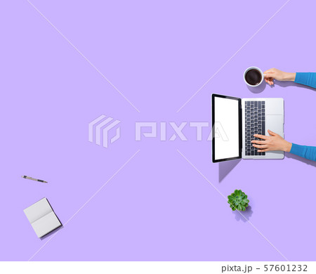 Person using a laptop computer Person using a laptop computer 57601232