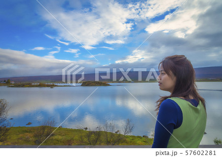 The moment of hope, Girl praying to the sunrise 57602281