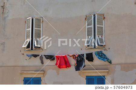 Building with washing in Ajaccio, Corsica, France. 57604973