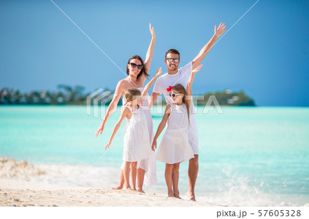 Young family on vacation have a lot of fun together Young family on vacation have a lot of fun together 57605328