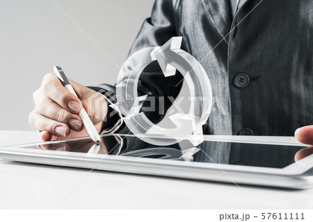 Female hands using graphics tablet and glass icons fly in air. Mixed media Female hands using graphics tablet and glass icons fly in air. Mixed media 57611111