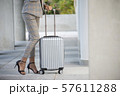 Business woman Dragging suitcase luggage 57611288