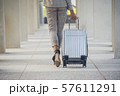 Business woman Dragging suitcase luggage 57611291