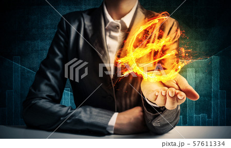 Businessman presenting euro symbol. Businessman presenting euro symbol. 57611334