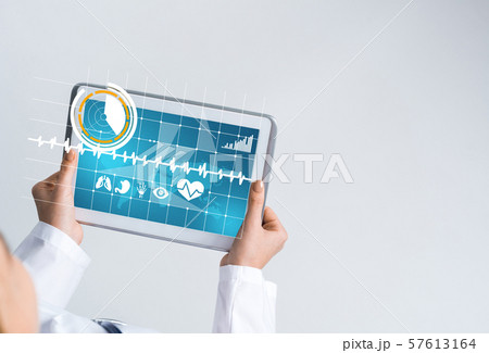 Close of female doctor hands working with tablet pc computer 57613164