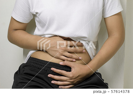 Women have a stomach ache Women have a stomach ache 57614378