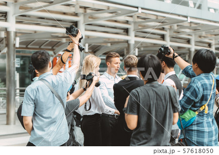 business man important press release surrounded business man important press release surrounded 57618050