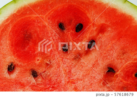 Half slices of tasty and ripe red watermelon on a 57618679