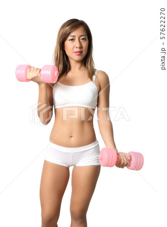 woman in white fitness clothes holding dumbbell in her hand woman in white fitness clothes holding dumbbell in her hand 57622270
