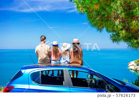 Summer car trip and young family on vacation Summer car trip and young family on vacation 57626173