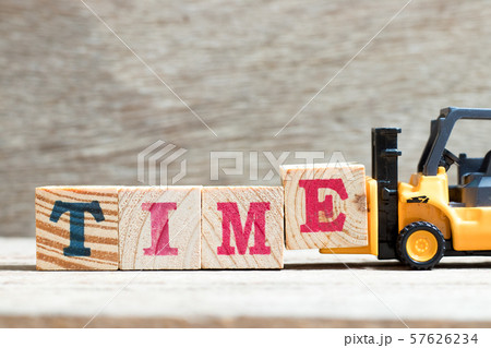 Toy forklift hold letter block E to complete word time 57626234