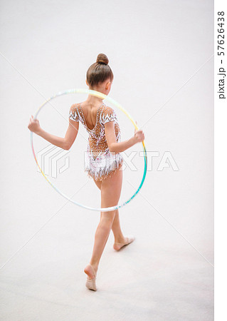 Little gymnast training on the carpet and ready for competitions 57626438