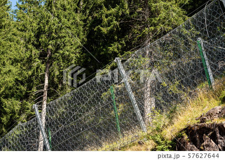 Rockfall barrier with wire mesh - Trentino Alto Adige Italy Rockfall barrier with wire mesh - Trentino Alto Adige Italy 57627644