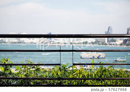 Metal balcony on blurred beach background 57627998
