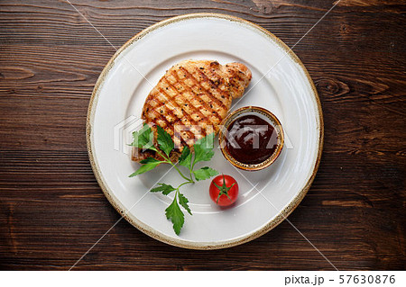 Steak on the bone with red sauce. restaurant menu 57630876