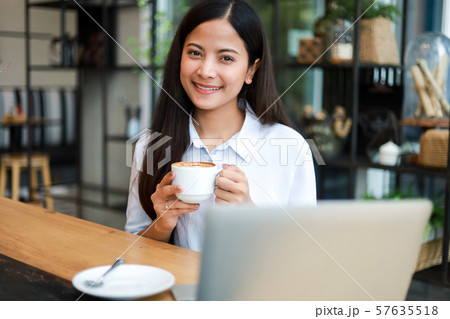 Asian woman in cafe 57635518