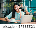 Asian woman in cafe 57635521