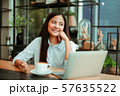 Asian woman in cafe 57635522