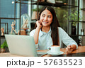 Asian woman in cafe 57635523