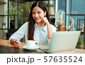 Asian woman in cafe 57635524