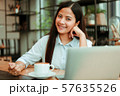 Asian woman in cafe 57635526