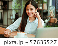 Asian woman in cafe 57635527