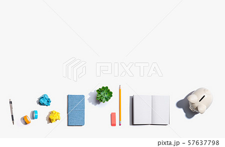 Piggy bank with office supplies Piggy bank with office supplies 57637798