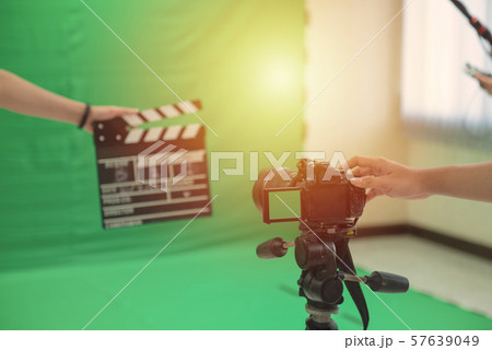 Hands hold black Clapperboard or movie slate. Hands hold black Clapperboard or movie slate. 57639049