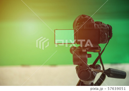 Videographer taking video camera, camera equipment 57639051