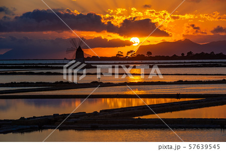 Marsala salt pans at sunset, Sicily, Italy Marsala salt pans at sunset, Sicily, Italy 57639545