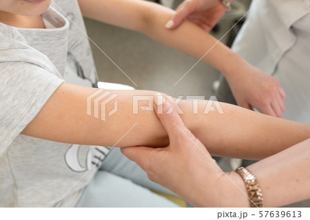 doctor dermatologist makes the initial examination doctor dermatologist makes the initial examination 57639613