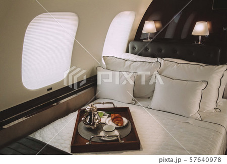 modern and comfortable interior of business jet aircraft with decor modern and comfortable interior of business jet aircraft with decor 57640978
