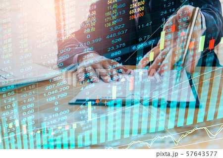 Stock market or forex trading graph and candlestick chart suitable for financial investment concept. Economy trends background for business idea and all art work design. Abstract finance background. Stock market or forex trading graph and candlestick chart suitable for financial investment concept. Economy trends background for business idea and all art work design. Abstract finance background. 57643577
