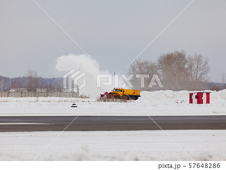Snowplow cleans snow 57648286