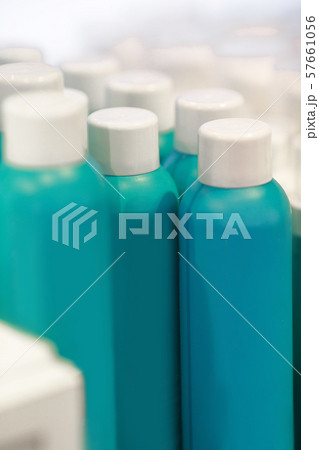 blue blank bottles with cosmetic products blue blank bottles with cosmetic products 57661056